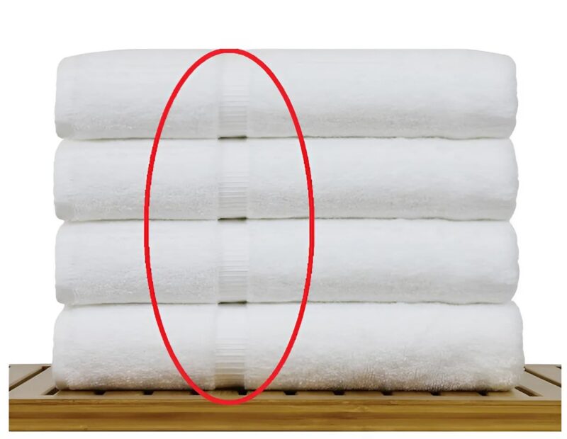 Sie werden nie erraten, wozu dieses kleine Band auf Ihrem Handtuch wirklich dient!